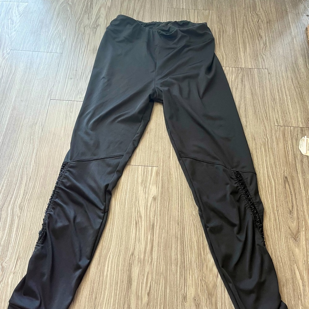 Pair of Sam Edelman leggings and Old Navy Leggings